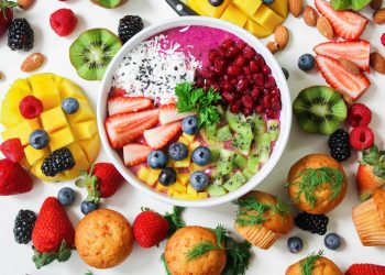 Assorted Sliced Fruits in White Ceramic Bowl