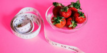 Strawberries And Measuring Tape