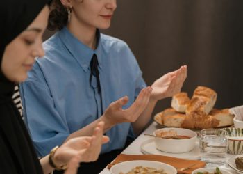 People Dining by the Table in Ramadan