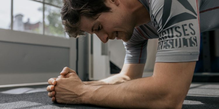 Man in Gray Shirt Planking