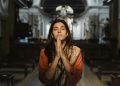 Woman Praying inside the Church