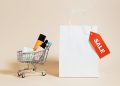 Shopping Cart Next to a Shopping Bag