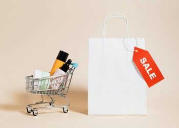 Shopping Cart Next to a Shopping Bag