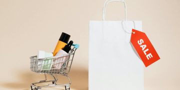 Shopping Cart Next to a Shopping Bag