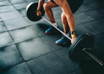 Person Holding Barbell