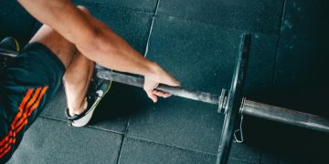 Person Carrying Barbell