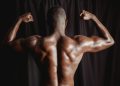 Shirtless Man With Muscular Body Flexing His Muscles